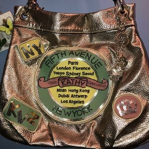 Bronze and beautiful! 2 ways to carry ! Fun with jeans or a lil black dress!